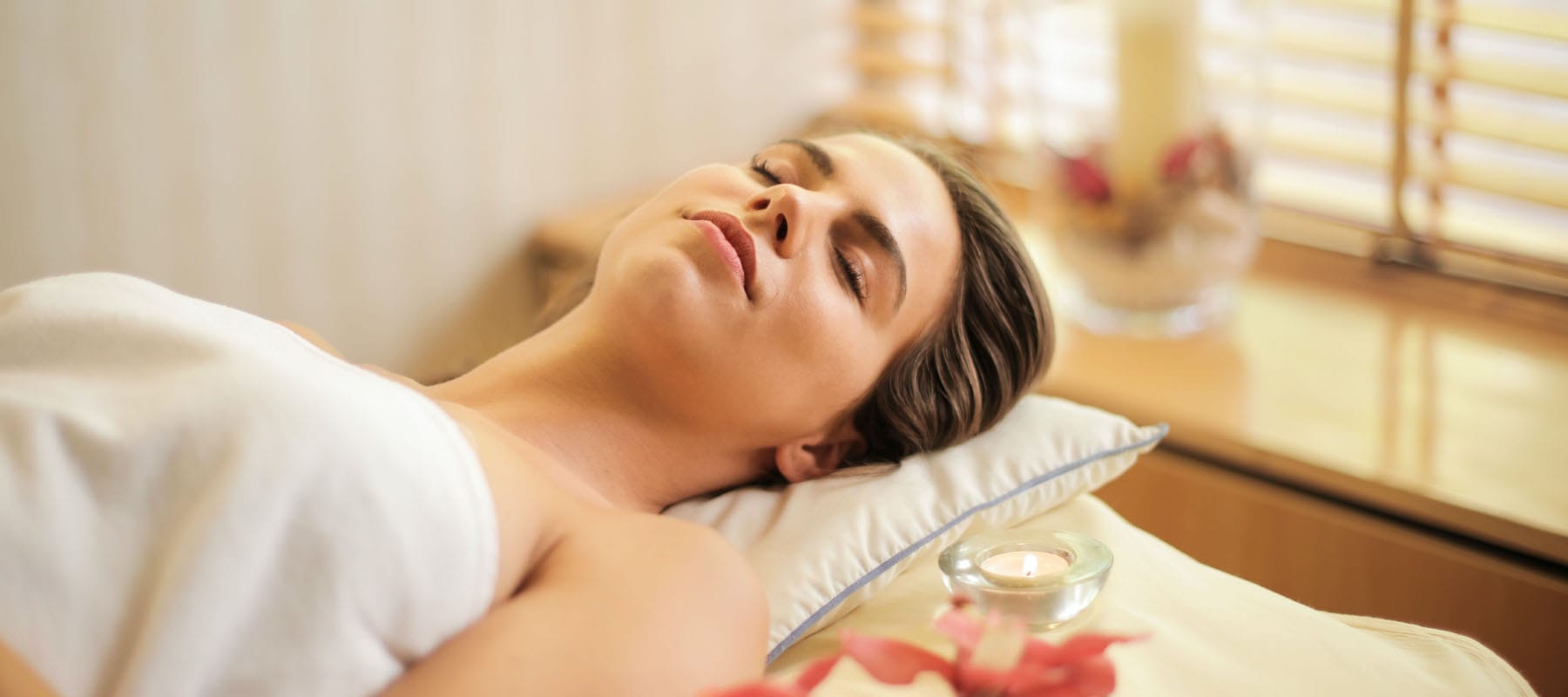 woman getting a herbal massage